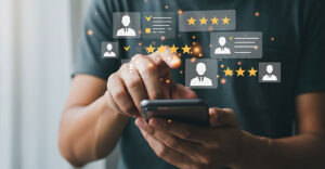 Consumer comparing product reviews and user-generated ratings on a smartphone, reflecting how shoppers rely on content—not brand names—to make confident purchase decisions.